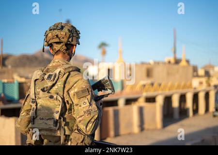 A U.S. Soldiers assigned to 1st Battalion, 63rd Armor Regiment, 2nd Armored Brigade Combat Team, 1st Infantry Division provides security and over watch during Decisive Action Rotation 22-09 at the National Training Center, Fort Irwin, Calif., Aug 11th, 2022. Stock Photo