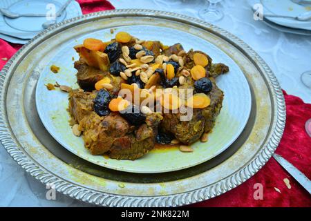 Moroccan meat dish with prunes and almonds Stock Photo