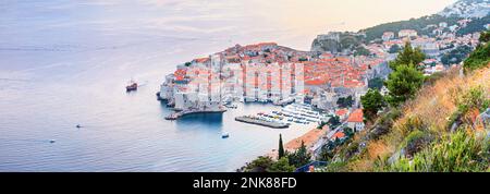 Panoramic top view of the Old Town of Dubrovnik, banner, panorama in beautiful evening light at sunset, the Adriatic coast of Croatia Stock Photo
