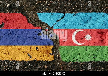 On the pavement there are images of the flags of Armenia and Azerbaijan, as a confrontation between the two countries. Conceptual image. Stock Photo