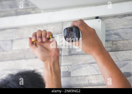 Security camera setup, cctv installation Stock Photo