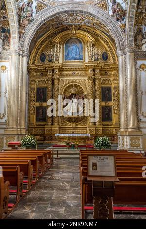 The altar and raredos altarpiece of the Rosary Chapel in the Church of Santo Domingo de Guzman in Oaxaca, Mexico.   Part of the UNESCO World Heritage Stock Photo