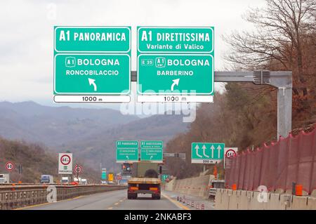 italian Road Signal at crossroad and name of two way to Florence called DIRETTISSIMA And Variante di Valico Stock Photo