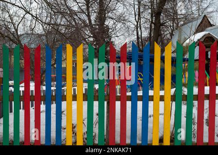 Multi colored wooden fence Stock Photo