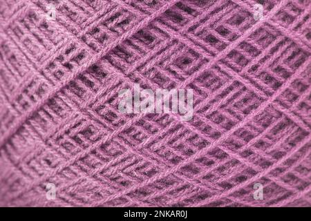 Purple ball of wool in a close up view Stock Photo