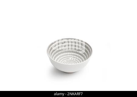 A white and black ceramic bowl on a white background with copy space Stock Photo