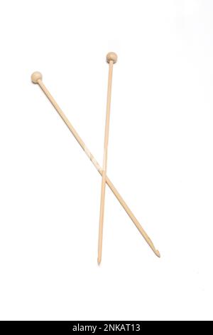 Wooden knitting needles isolated on a white background with copy space Stock Photo