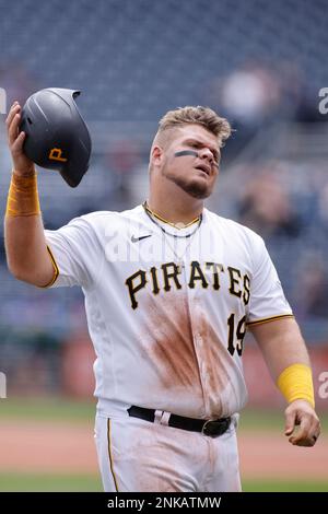 Pittsburgh Pirates' Daniel Vogelbach listens to home plate umpire