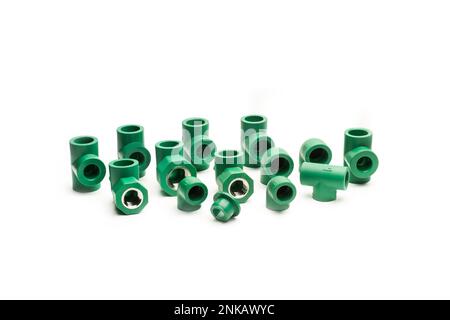 Green plastic connectors for water pipes on a white background with copy space Stock Photo
