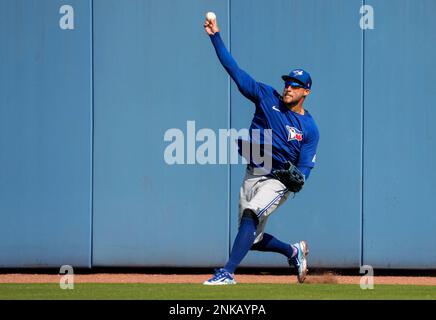 Seattle Mariners center fielder Jarred Kelenic throws the ball from the  outfield with right fielder Mitch Haniger behind Detroit Tigers during a  baseball game, Wednesday, Oct. 5, 2022, in Seattle. (AP Photo/John