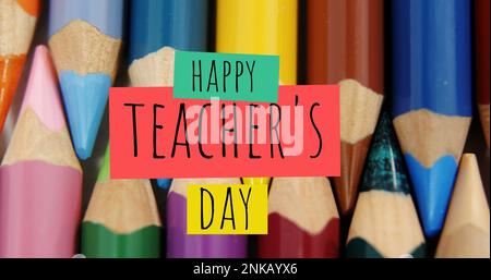 Image of happy teachers day text over pencils Stock Photo