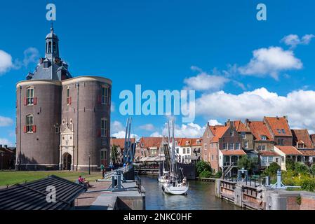 Townscape with the former Dromedaris defence defence tower and the entrance to the Old Harbour, Enkhuizen, North Holland, Netherlands Stock Photo