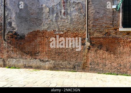 Old brick wall with red brick background, Concrete crack, vintage wall background Stock Photo