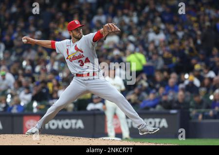 MILWAUKEE, WI - APRIL 14: St. Louis Cardinals starting pitcher Adam  Wainwright (50) waits for a sign during a game between the Milwaukee  Brewers and the St. Louis Cardinals at American Family