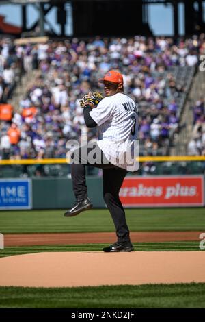 DENVER, CO - APRIL 08: Denver Broncos QB Russell Wilson chats with Colorado  Rockies left fielder Kris Bryant (23) before throwing out the first pitch  during the Colorado Rockies Opening Day game