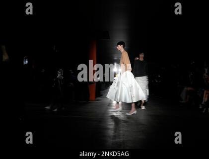 Milan, Italy. 23rd Feb, 2023. Models present creations from Prada women's Fall/Winter 2023/2024 collection during Milan Fashion Week in Milan, Italy, on Feb. 23, 2023. Credit: Str/Xinhua/Alamy Live News Stock Photo