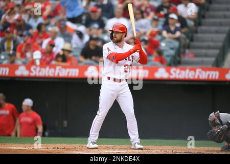 ANAHEIM, CA - APRIL 10: Los Angeles Angels center fielder Mike Trout (27)  greets right fielder Hunter Renfroe (12) at the plate after both scored on  a Angels hit in the first