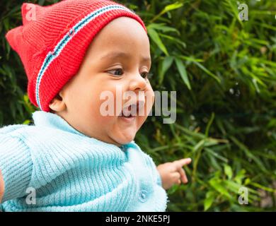 laughing baby with his mother, nuwaraeliya, sri lanka. Stock Photo