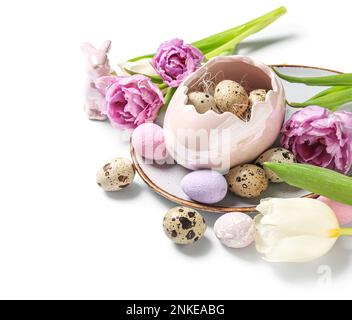 Tulip flowers and decorative shell with Easter quail eggs on white ...