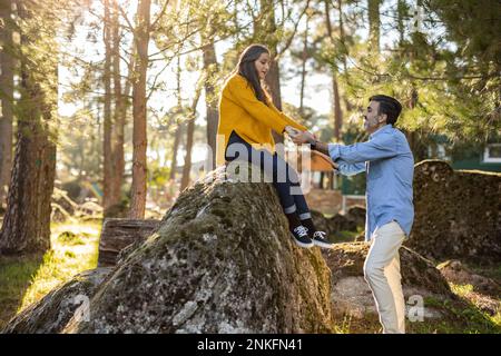 Affectionate mature couple holding hands outdoors Stock Photo