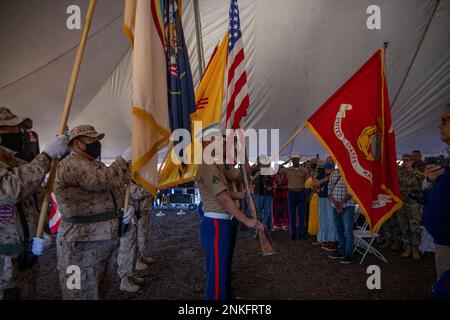 Marines with Bulk Fuel Company, 6th Engineer Support Battalion, 4th Marine Logistics Group, and The Upper Fruitland Veteran Color Guard, present the Marne Corps and Navajo Colors during the 80th anniversary of the founding of the Navajo Code Talkers at Tse Bonito, N.M., Aug. 14, 2022. In 1982, U.S. President Ronald Reagan designated Aug. 14 as National Navajo Code Talkers Day. Proclamation 4954 encouraged all Americans to remember and honor the contributions of the Navajo Nation and all Native Americans who gave of their  special talents and their lives in service of our country so that others Stock Photo