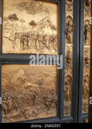 The Gates of Paradise by Lorenzo Ghiberti, 1452, gilded bronze, by Santa Maria del Fiore in Florence Baptistery Cathedral East Gates, Florence, Italy Stock Photo