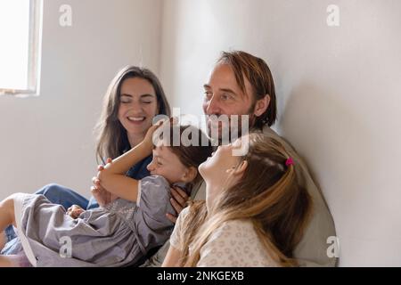 Happy family having fun together at home Stock Photo