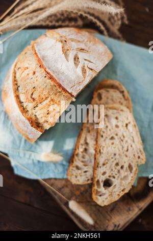 Freshly baked sourdough bread on napkin Stock Photo
