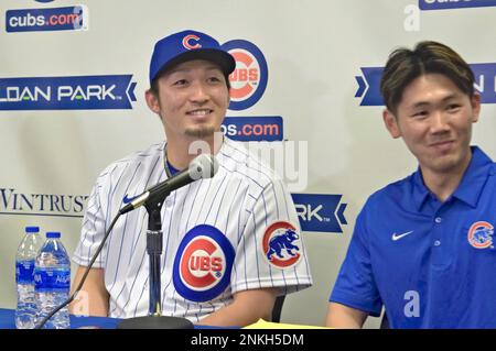 Japanese outfielder Seiya Suzuki (L) attends a spring practice session in  Mesa, Arizona on March 19, 2022. The 27-year-old Suzuki recorded .317 with  38 homers and 88 RBIs in 132 games last