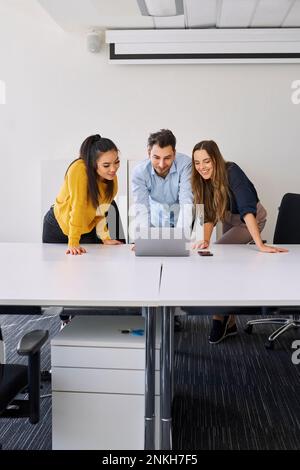 Business colleagues conducting office meeting at workplace Stock Photo