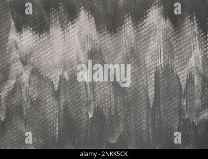 Watercolor stroke and spray on paper , Abstract background by hand drawn gray and black color liquid drip Stock Photo