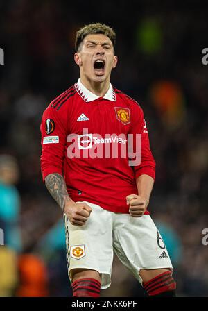 Manchester, UK. 24th Feb, 2023. Manchester United's Lisandro Martinez celebrates at the final whistle of the UEFA Europa League play-off 2nd leg match between Manchester United and Barcelona in Manchester, Britain, Feb. 23, 2023. Credit: Xinhua/Alamy Live News Stock Photo