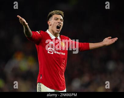Manchester, UK. 24th Feb, 2023. Manchester United's Lisandro Martinez celebrates at the final whistle of the UEFA Europa League play-off 2nd leg match between Manchester United and Barcelona in Manchester, Britain, Feb. 23, 2023. Credit: Xinhua/Alamy Live News Stock Photo