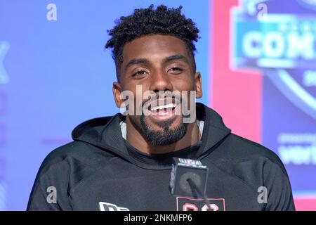 Stanford defensive lineman Thomas Booker leaps during the broad jump at the  NFL football scouting combine, Saturday, March 5, 2022, in Indianapolis.  (AP Photo/Charlie Neibergall Stock Photo - Alamy