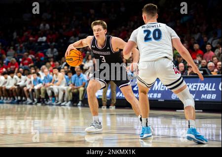 Lipscomb guard Trae Benham looks for the next move against