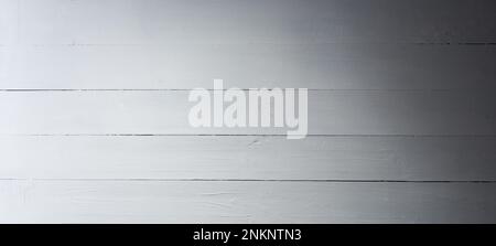 Wooden white wall. White wood surface with long boards lined up.gradient texture Stock Photo