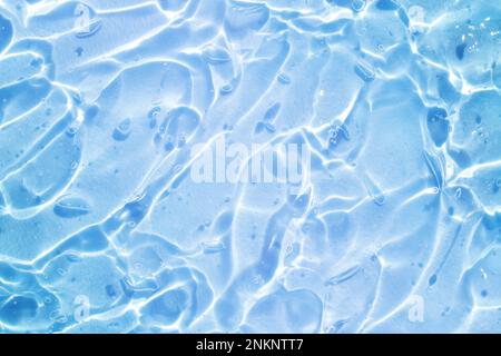 blue water wave abstract, pure natural ripple and bubble texture, gel soap, background photography Stock Photo
