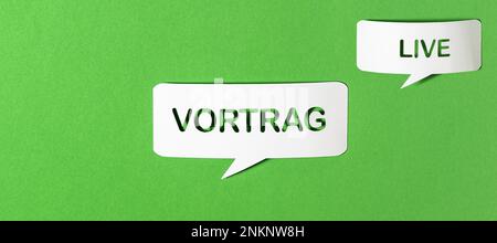 German text lecture and English text live each in a paper speech bubble punched out on green paper background. Photorealistic vector in banner format. Stock Vector