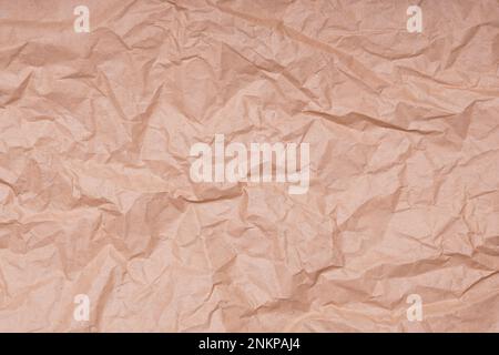 crumpled creased brown paper background texture Stock Photo