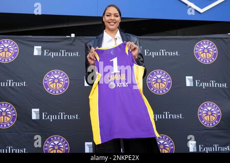 Liz Cambage poses with Los Angeles Sparks jersey during press