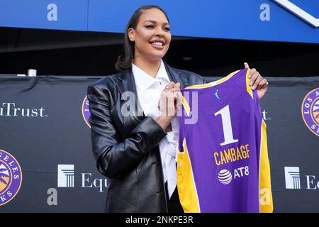 Liz Cambage poses with Los Angeles Sparks jersey during press