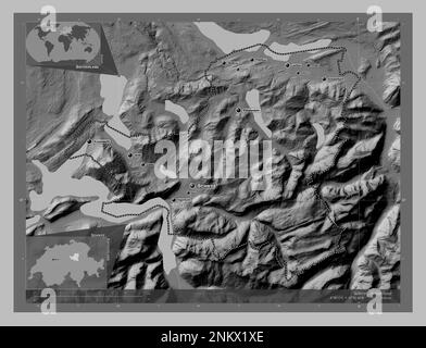 Schwyz, canton of Switzerland. Grayscale elevation map with lakes and rivers. Locations and names of major cities of the region. Corner auxiliary loca Stock Photo