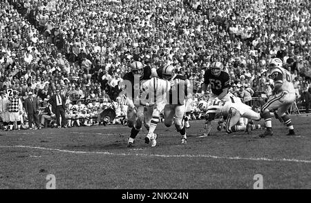 The Heidi game between The New York Jets and the Oakland Raiders,  November 17, 1968 Joe Namath is brought down by Ben Davidson and Carleton  Oats (Bill Young/San Francisco Chronicle via AP