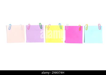 Multi colored paper stickers for writing notes white background Stock Photo