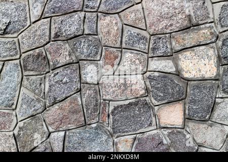 Rubble gray stone wall, rubblework. Stock Photo