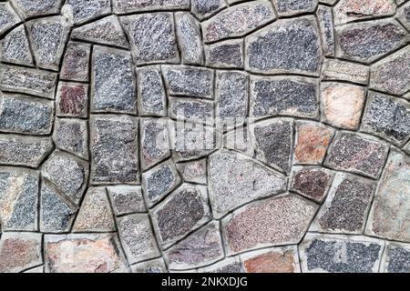 Rubble gray stone wall, rubblework. Stock Photo
