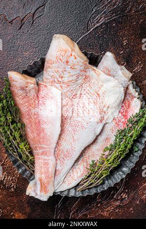 Raw red perch fillet, redfish fish meat. Isolated on white background ...
