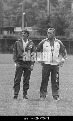 First Ajax training new season; Johan Cruijff (l) and Cor van der Hart (one of the trainers) ca. 1985 Stock Photo