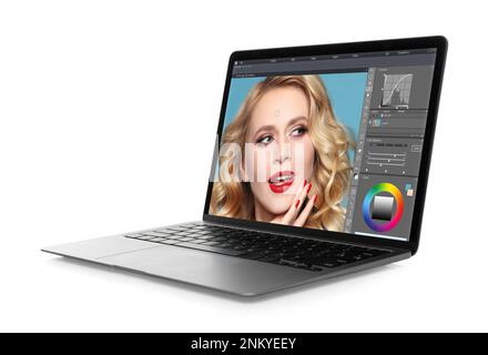 Laptop with photo editor application isolated on white Stock Photo