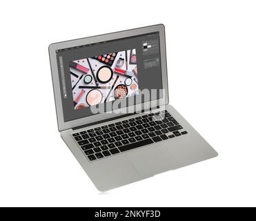 Laptop with photo editor application isolated on white Stock Photo